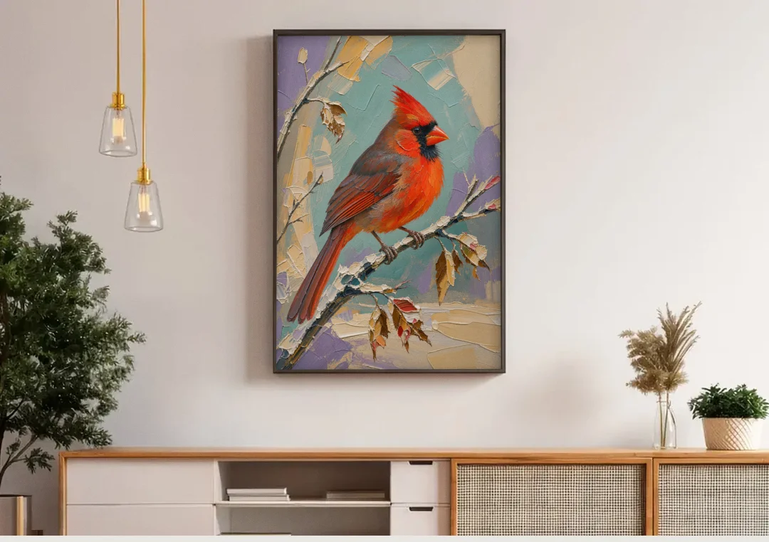 Northern Cardinal on a Snowy Branch canvas wall art above a wooden sideboard under pendant lights