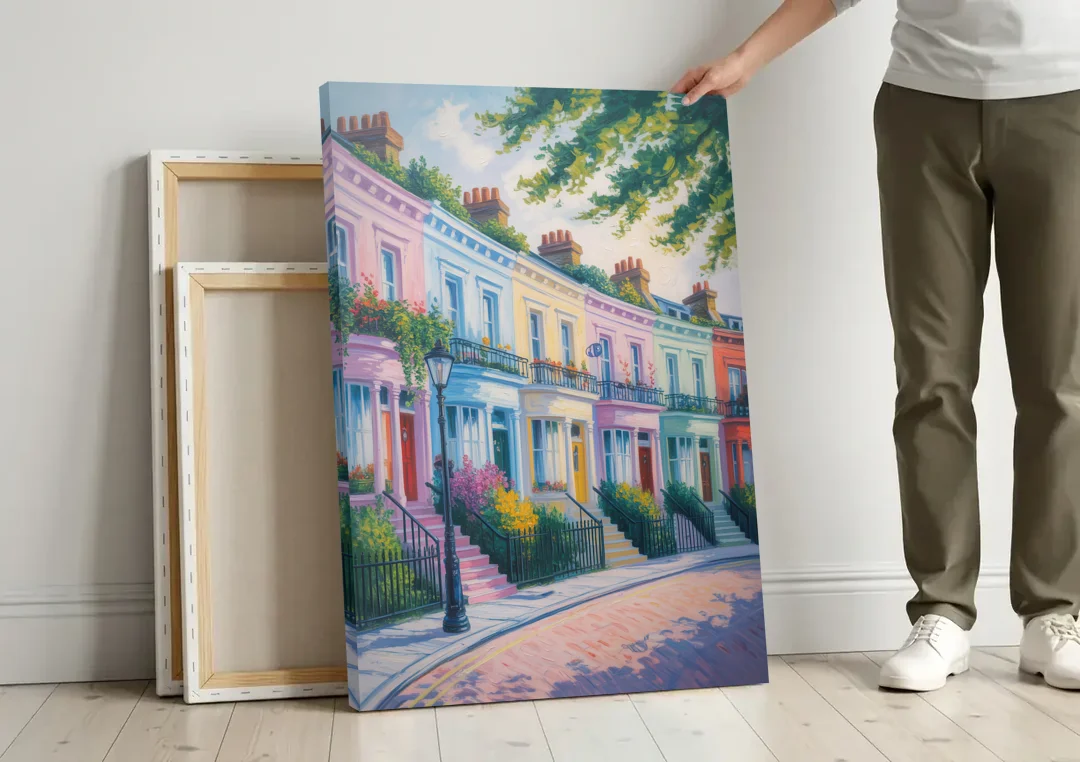 Notting Hill Colors canvas wall art leaning against a wall next to blank canvases