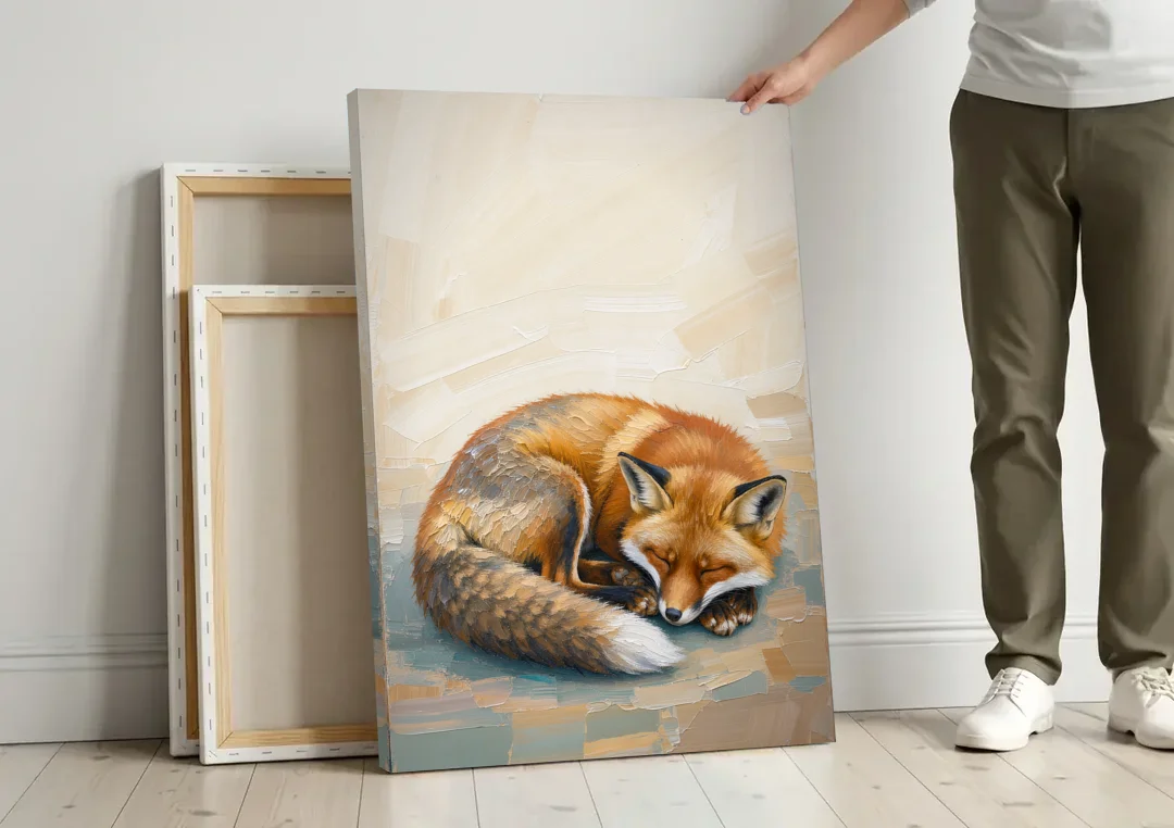 Nursery Wall Art Woodland Sleeping Fox Kit canvas wall art leaning against a wall next to blank canvases