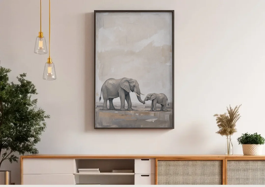 Nursery Wall Decor Above Crib with Elephant Trunks Touching canvas wall art above a wooden sideboard under pendant lights