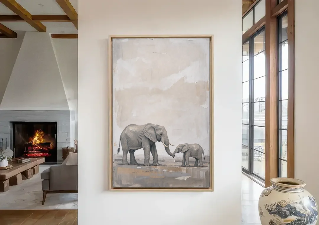 Nursery Wall Decor Above Crib with Elephant Trunks Touching canvas wall art in a living room with a fireplace