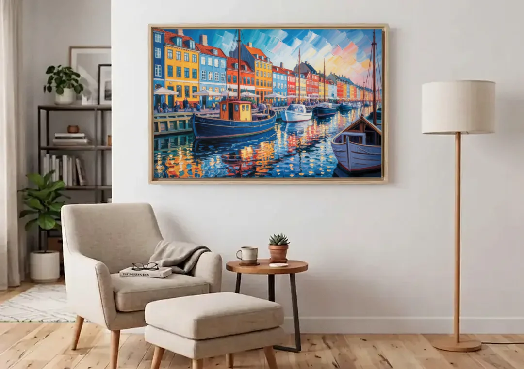 Nyhavn Serenity canvas wall art above an armchair in a bright living room