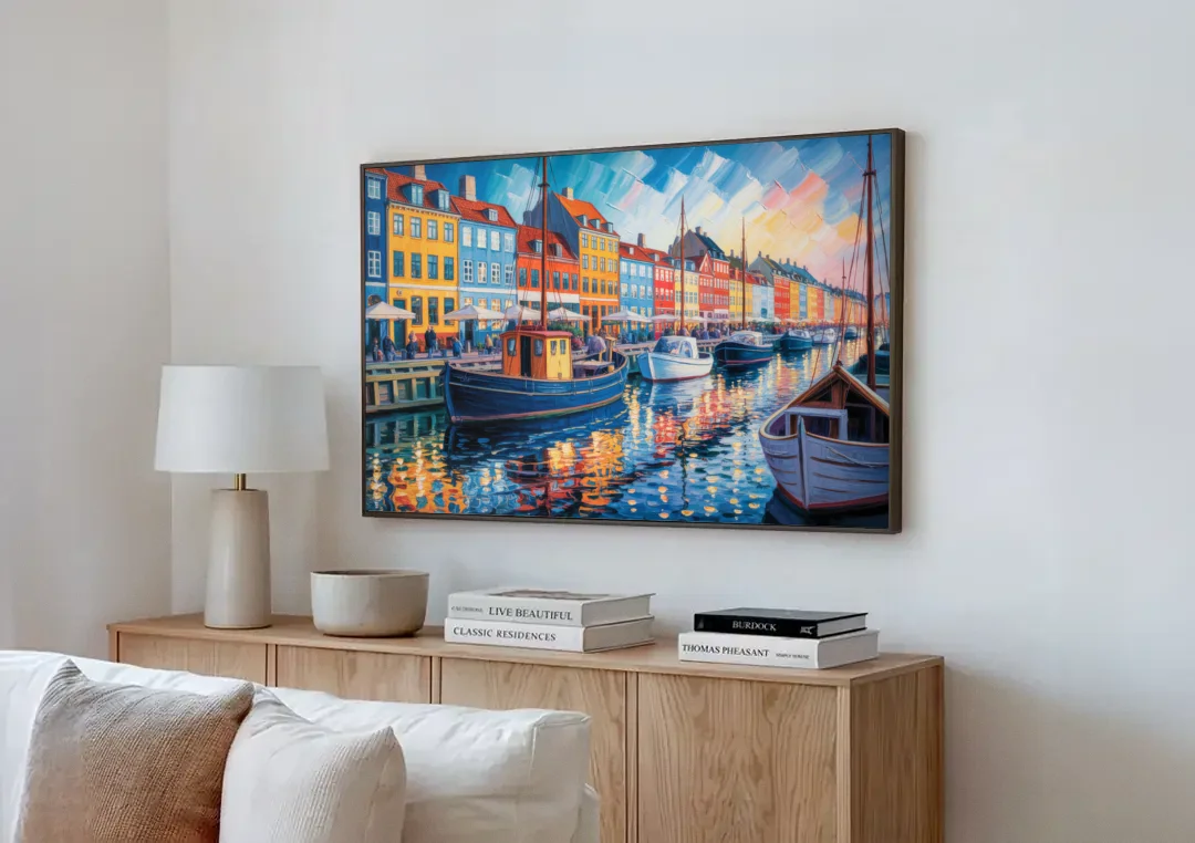 Nyhavn Serenity canvas wall art above a wooden sideboard next to a sofa