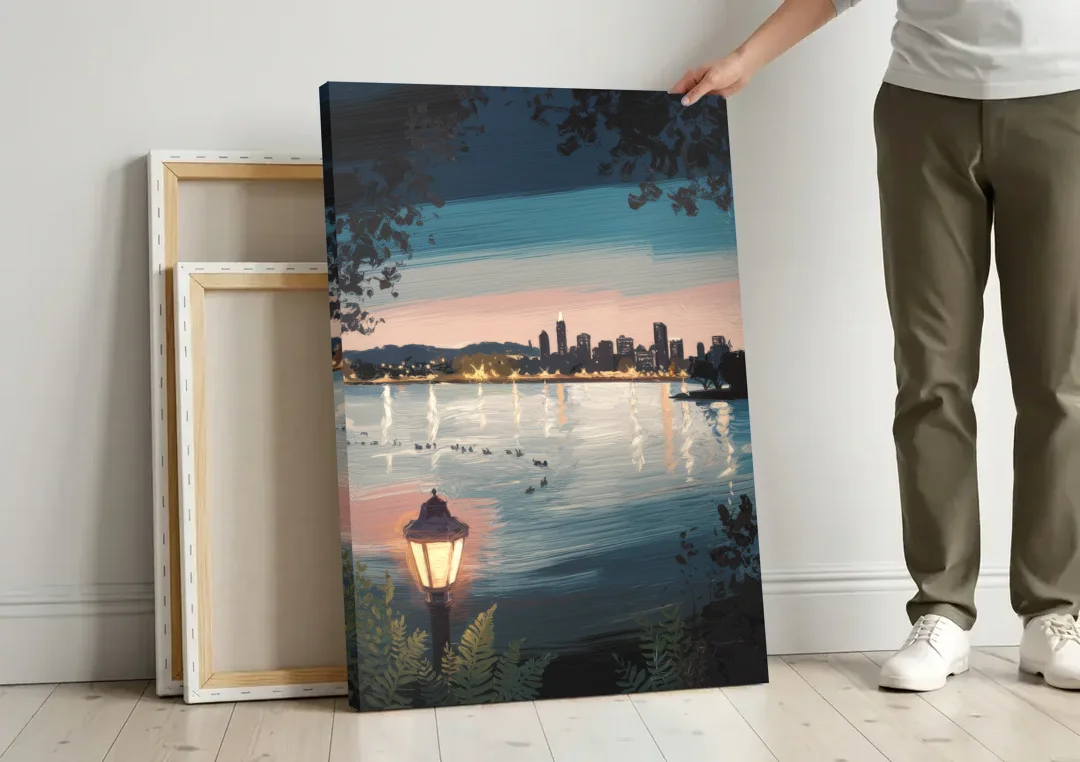 Oakland Lake Merritt Reflection canvas wall art leaning against a wall next to blank canvases