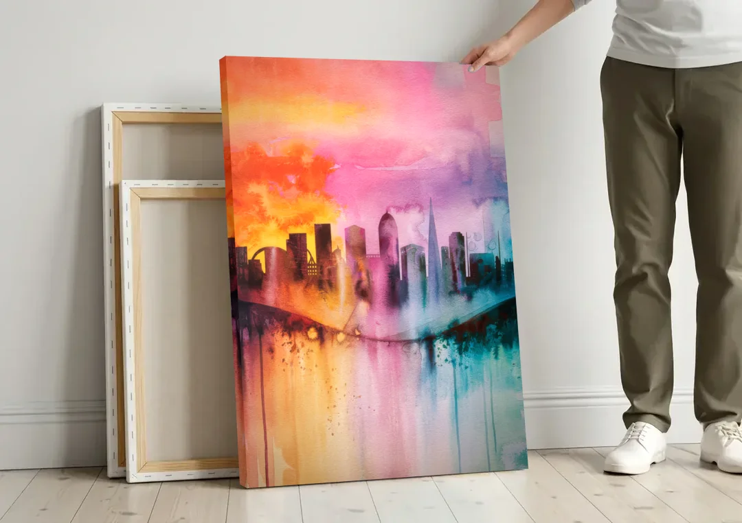Oakland Skyline Sunset canvas wall art leaning against a wall next to blank canvases