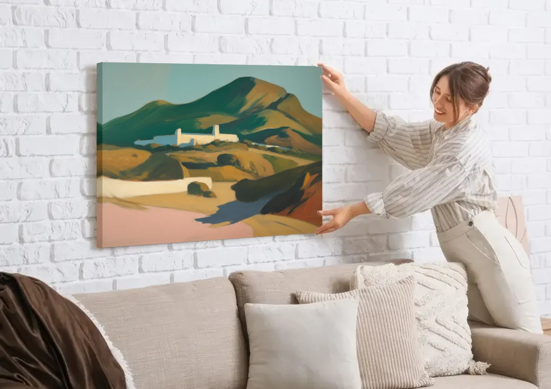 Obispado Hill Vista canvas wall art being hung on a white brick wall above a sofa