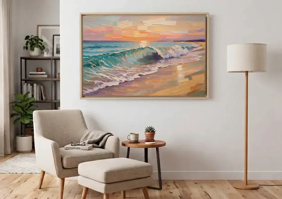 Ocean Wave Painting of a Sunset Curl canvas wall art above an armchair in a bright living room