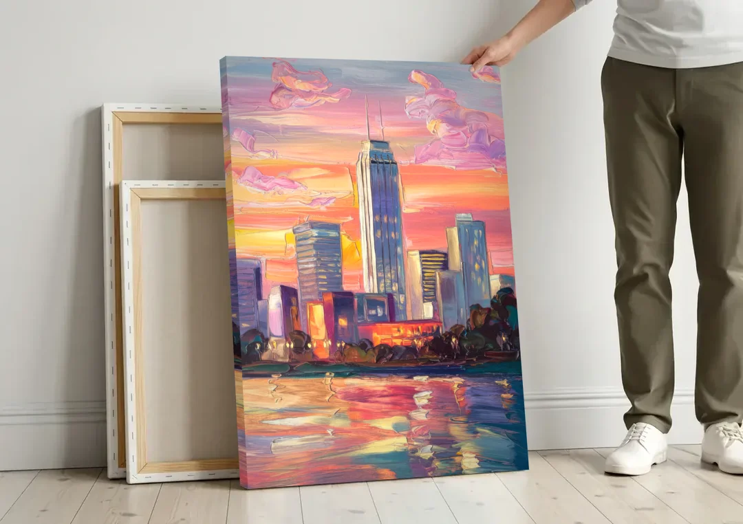 Oklahoma City Downtown Sunset canvas wall art leaning against a wall next to blank canvases