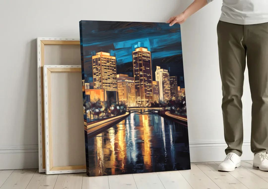 Oklahoma City Night Lights canvas wall art leaning against a wall next to blank canvases