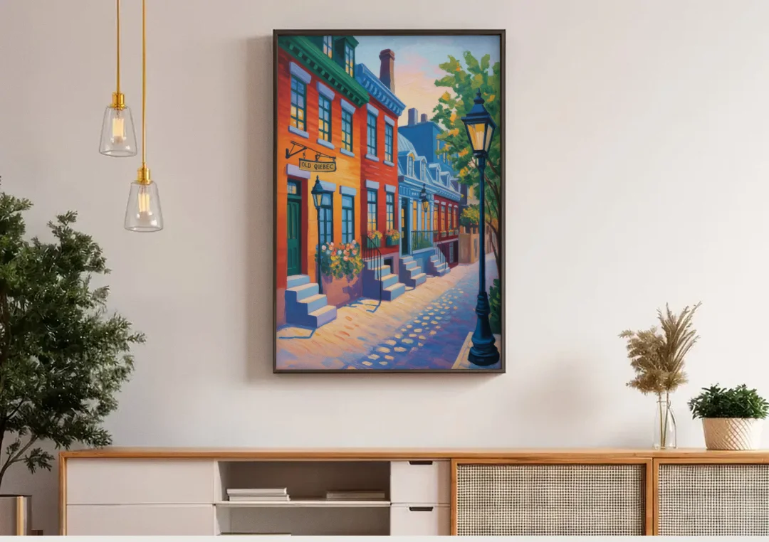 Old Quebec Streets canvas wall art above a wooden sideboard under pendant lights