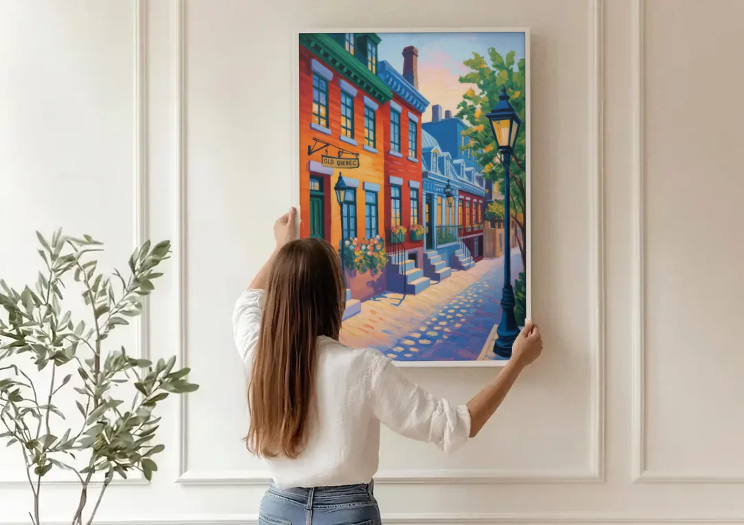 Old Quebec Streets canvas wall art being hung on a paneled wall