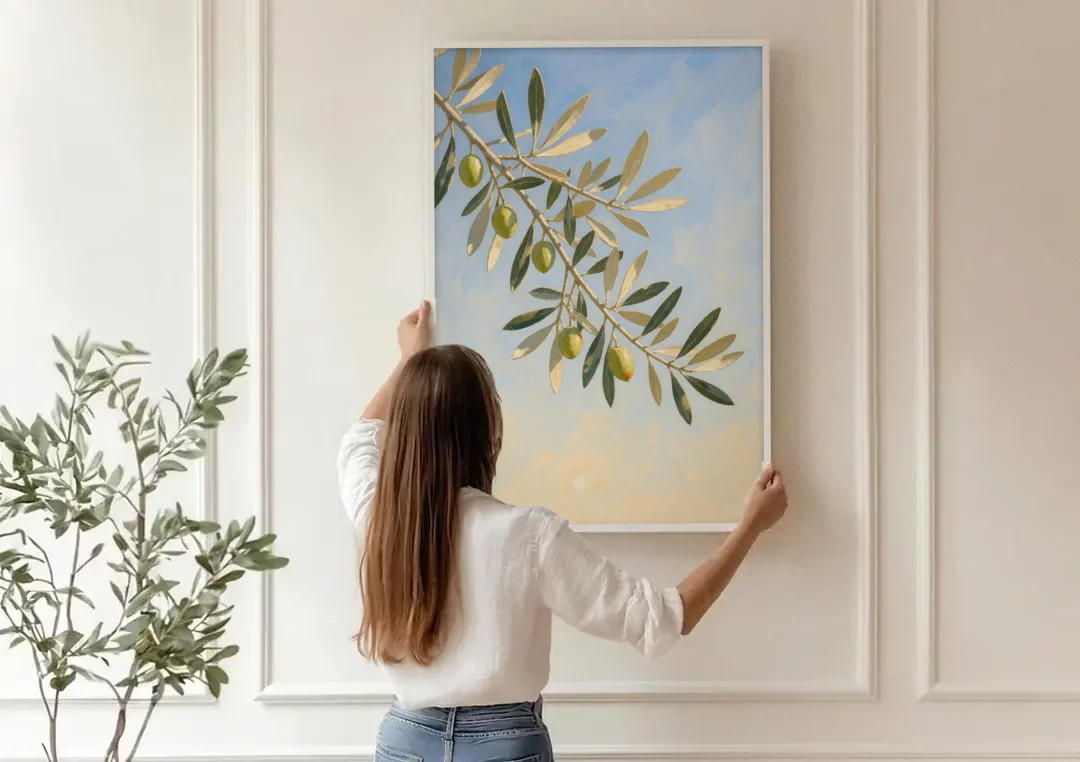 Olive Branch Under Sunny Sky for the Kitchen canvas wall art being hung on a paneled wall