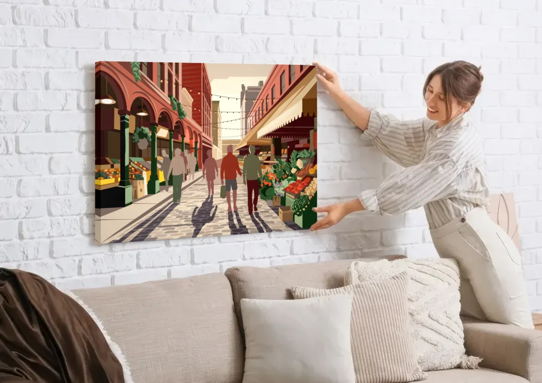 Omaha Old Market Charm canvas wall art being hung on a white brick wall above a sofa