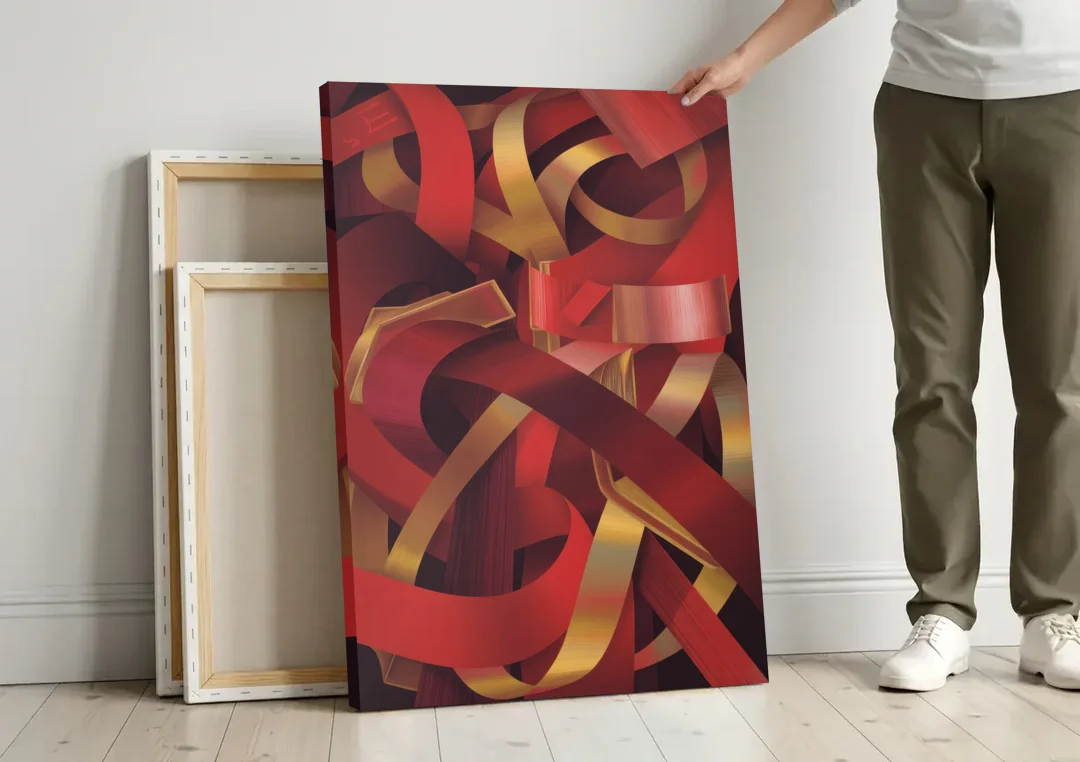 Opulent Fusion Red Abstract canvas wall art leaning against a wall next to blank canvases