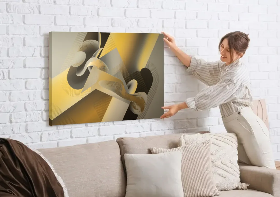 Opulent Geometrics Yellow and Grey Abstract canvas wall art being hung on a white brick wall above a sofa