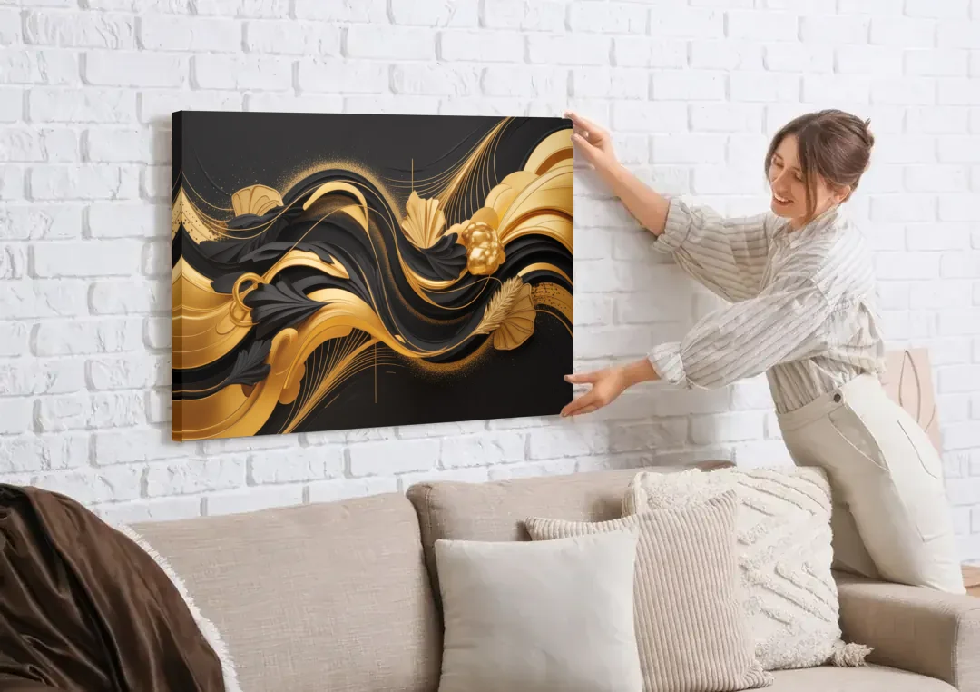 Opulent Harmony Black and Gold Abstract canvas wall art being hung on a white brick wall above a sofa