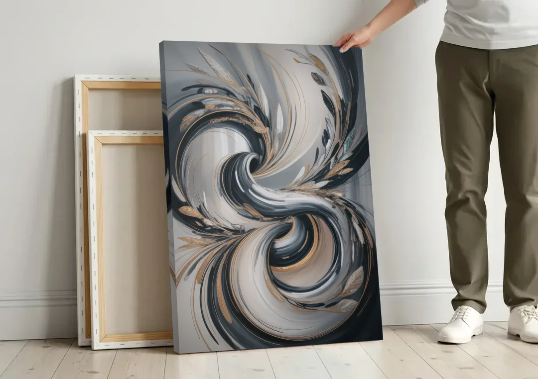 Opulent Iridescence Grey Abstract canvas wall art leaning against a wall next to blank canvases