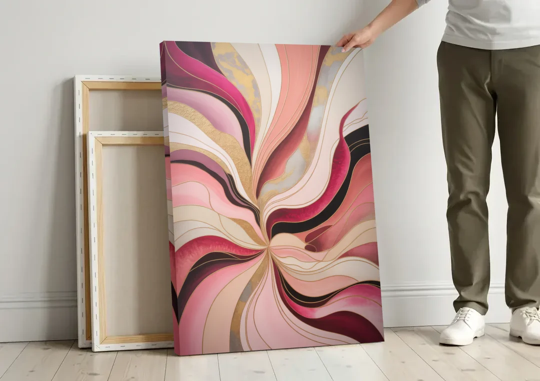 Opulent Serenity Pink Abstract canvas wall art leaning against a wall next to blank canvases