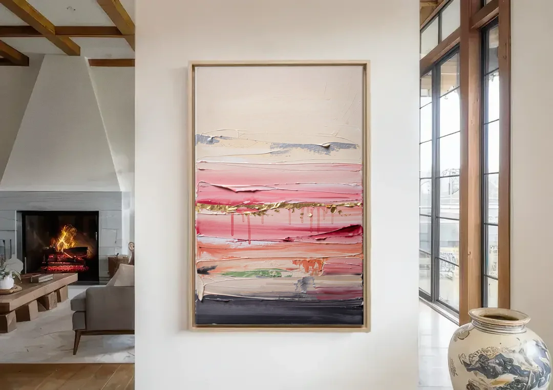 Opulent Serenity Pink and Gold Abstract canvas wall art in a living room with a fireplace
