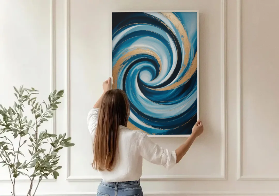 Opulent Swirl Blue and Gold Abstract canvas wall art being hung on a paneled wall