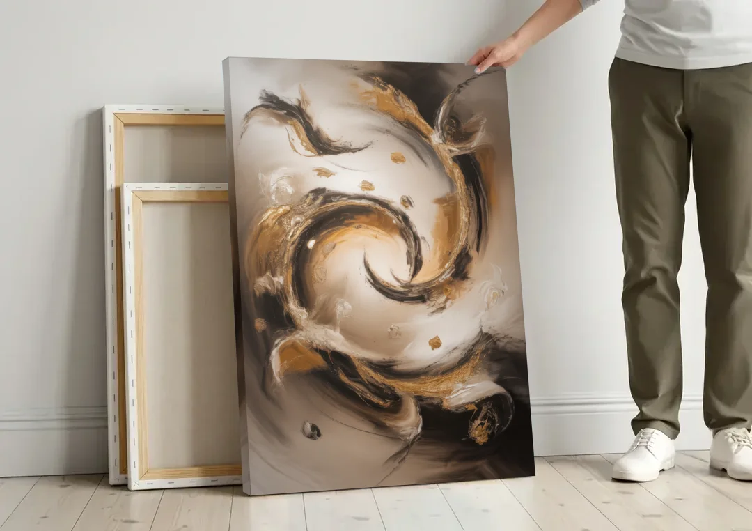 Opulent Swirls Brown Abstract canvas wall art leaning against a wall next to blank canvases