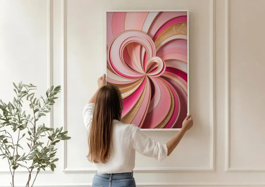 Opulent Swirls Pink and Gold Abstract canvas wall art being hung on a paneled wall