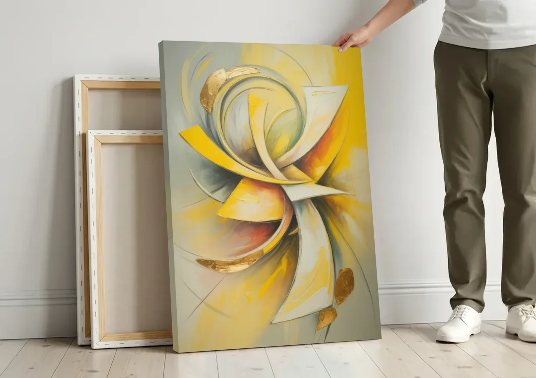 Opulent Vortex Yellow Abstract canvas wall art leaning against a wall next to blank canvases