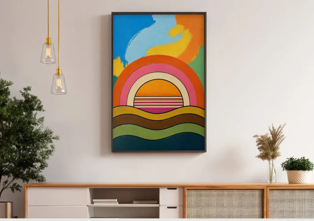 Orange and Pink Wall Art with a Rainbow Sun canvas wall art above a wooden sideboard under pendant lights