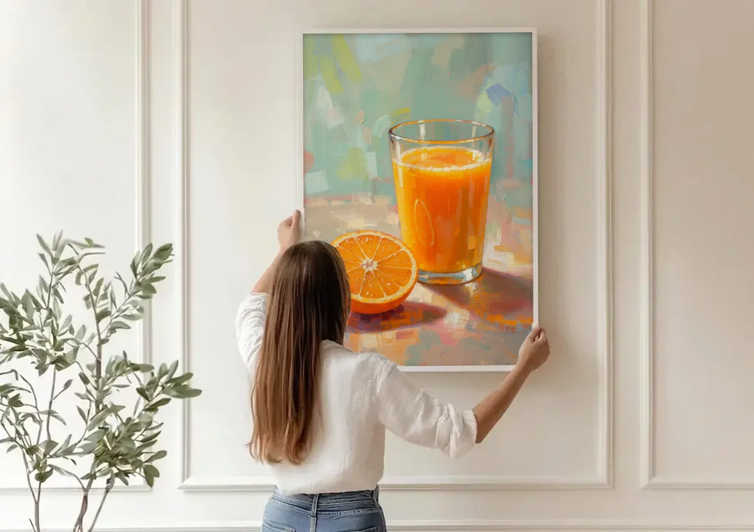 Orange Kitchen Wall Art with Morning Juice canvas wall art being hung on a paneled wall
