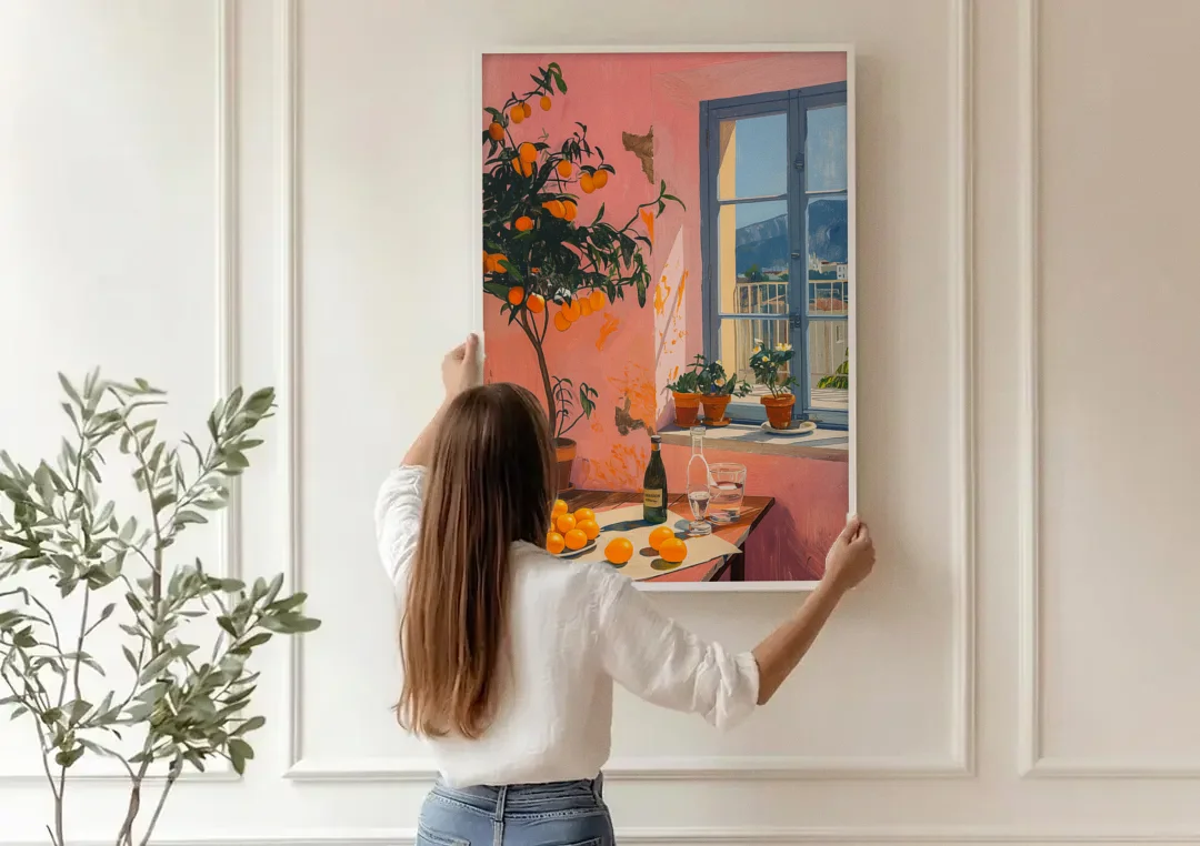 Orange Painting of a Sunny Kitchen Window canvas wall art being hung on a paneled wall