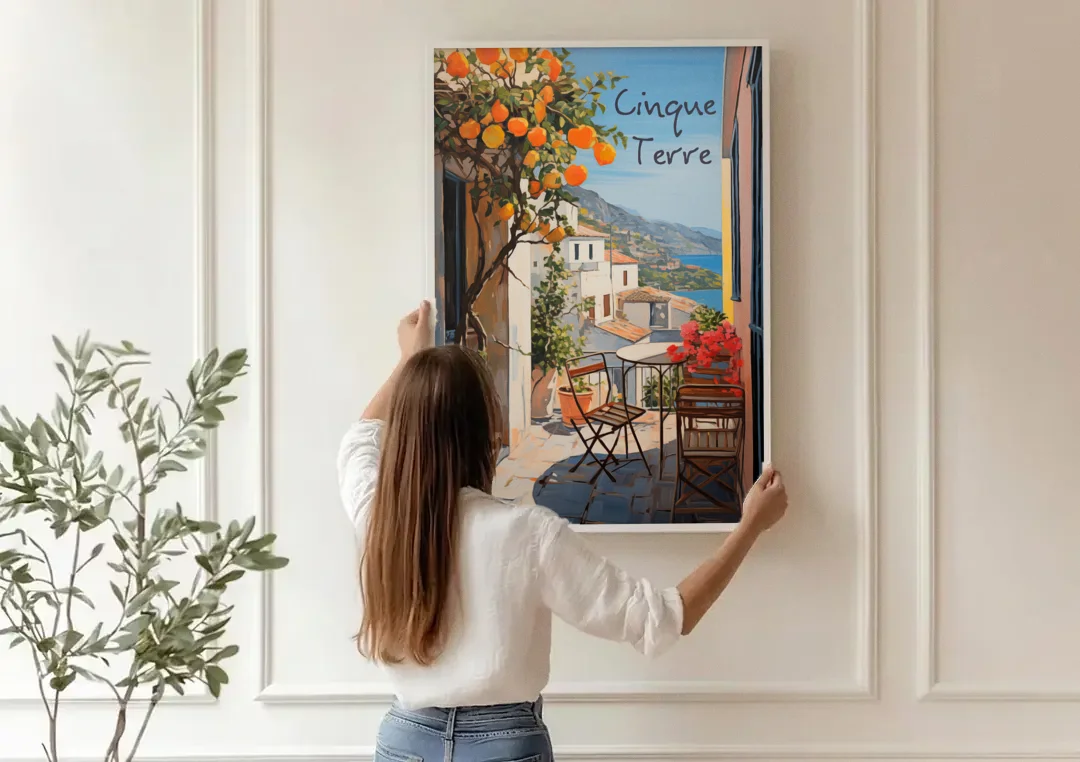 Orange Tree Painting on a Cinque Terre Terrace canvas wall art being hung on a paneled wall