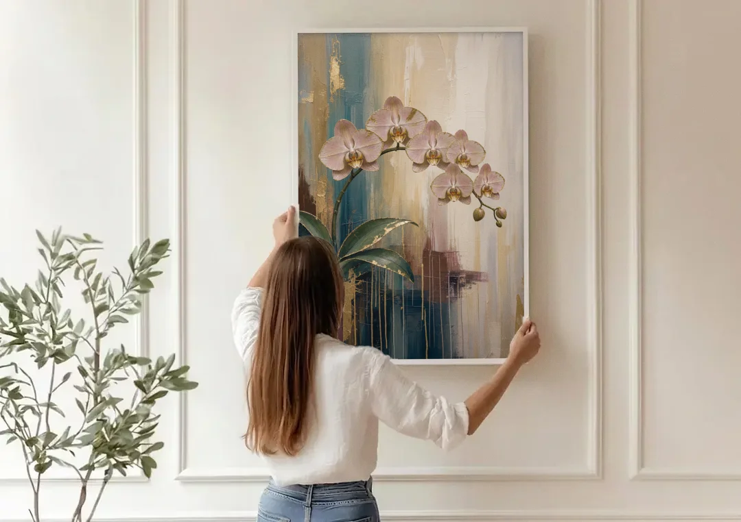 Orchid Canvas Painting with Gold Leaf Edges canvas wall art being hung on a paneled wall