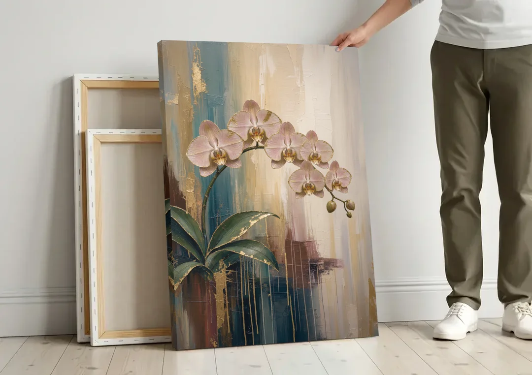 Orchid Canvas Painting with Gold Leaf Edges canvas wall art leaning against a wall next to blank canvases