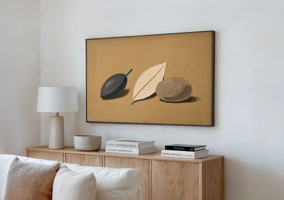 Organic Modern Home Decor with Seed, Leaf and Pebble canvas wall art above a wooden sideboard next to a sofa