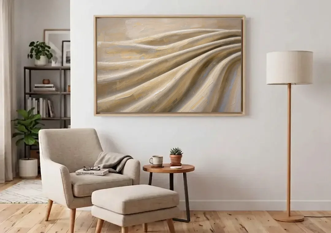 Organic Modern Wall Art of Draped Linen Folds canvas wall art above an armchair in a bright living room