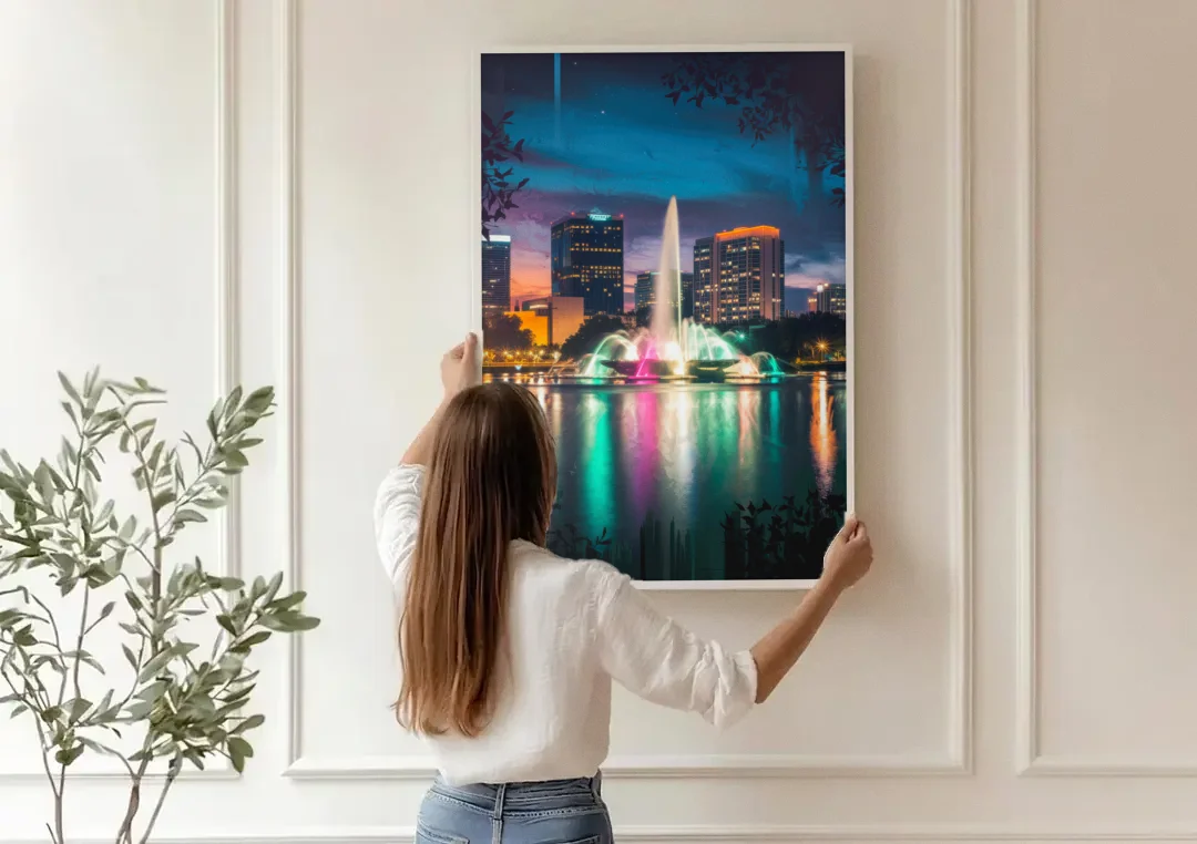 Orlando Downtown Night Lights canvas wall art being hung on a paneled wall
