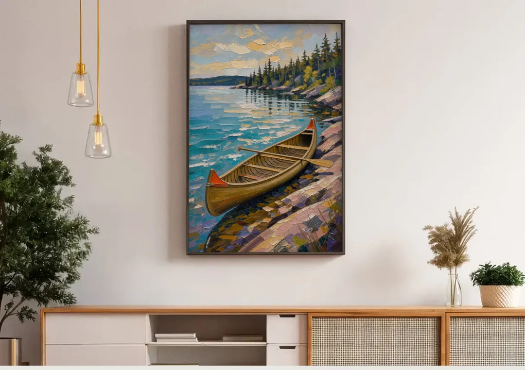 Outdoorsy Wall Art of a Lakeside Canoe canvas wall art above a wooden sideboard under pendant lights