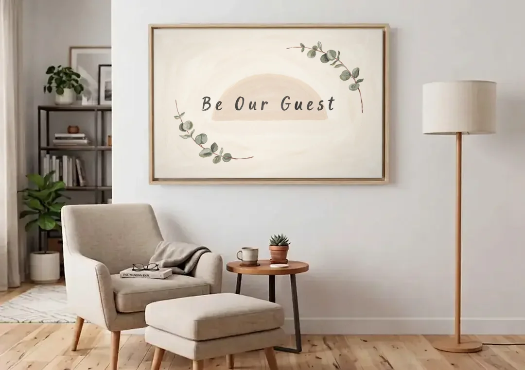 Over the Bed Wall Art Be Our Guest Eucalyptus canvas wall art above an armchair in a bright living room