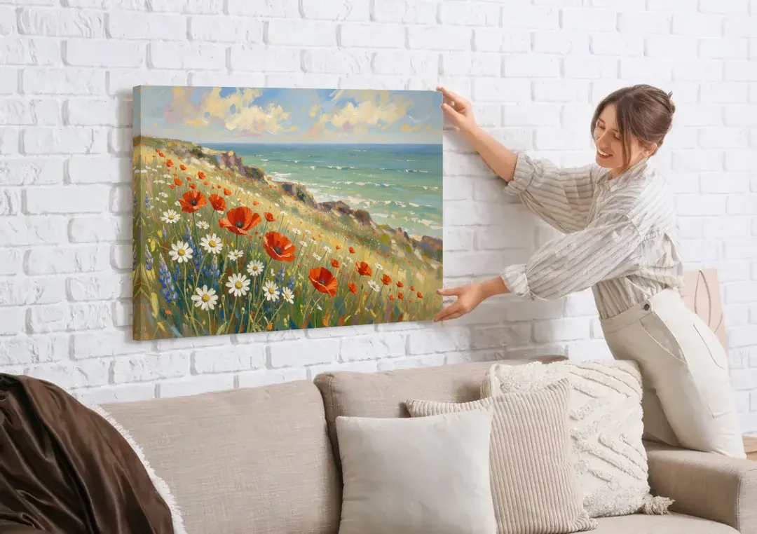Over the Couch Wall Art with Seaside Poppies canvas wall art being hung on a white brick wall above a sofa