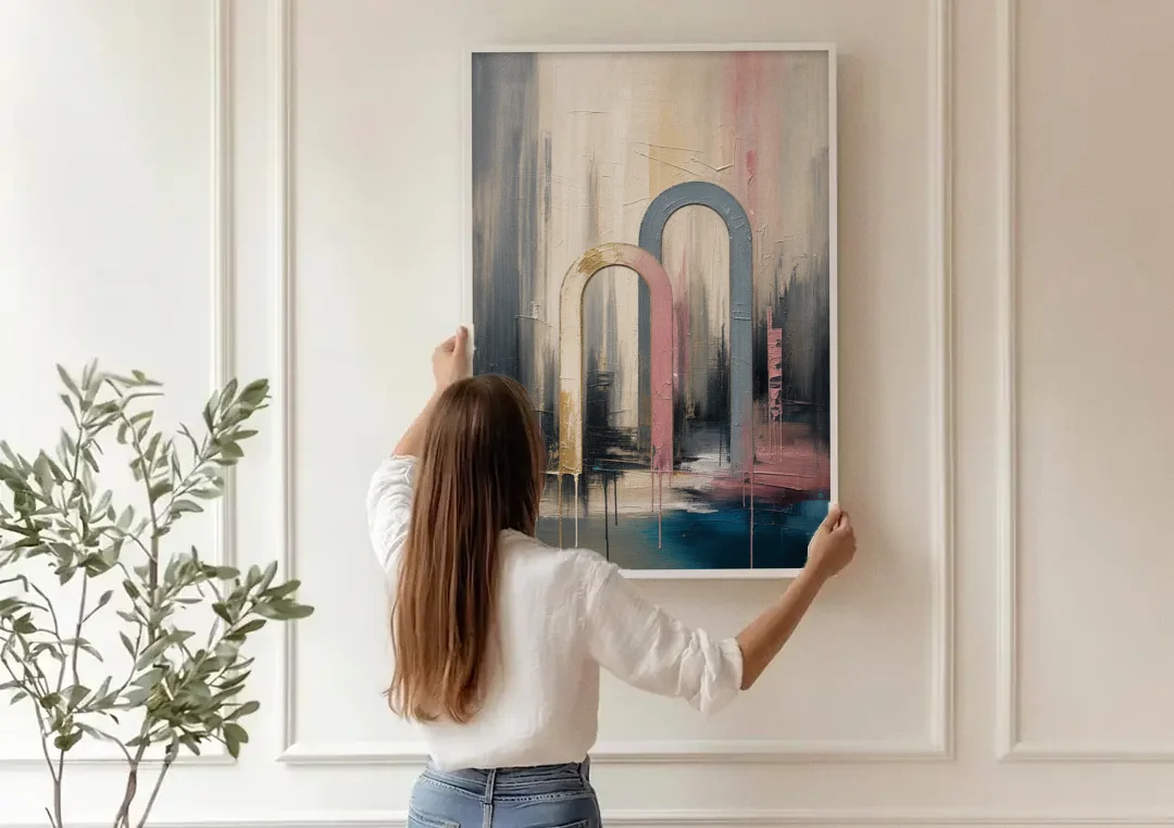 Overlapping Ivory and Slate Arches canvas wall art being hung on a paneled wall