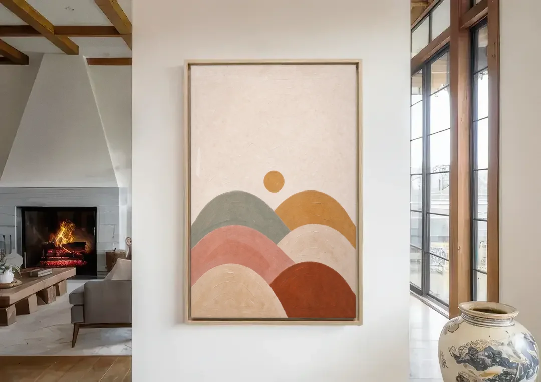 Overlapping Scalloped Hills Under a Small Sun canvas wall art in a living room with a fireplace
