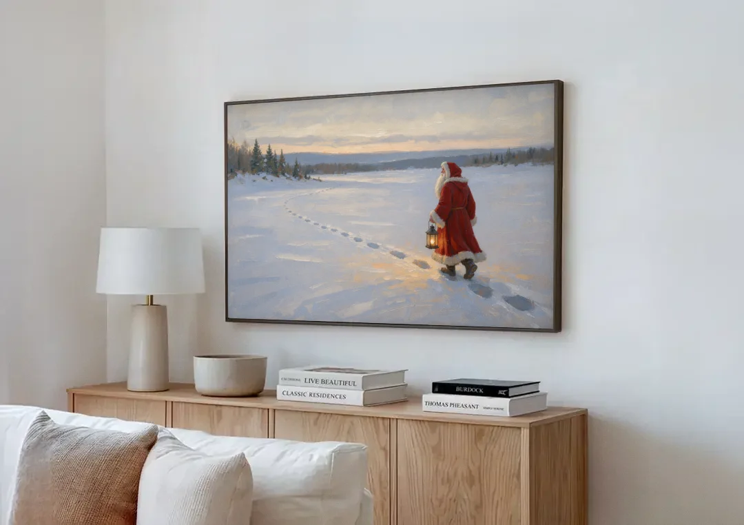 Oversized Christmas Wall Art of Santa's Lantern Walk canvas wall art above a wooden sideboard next to a sofa