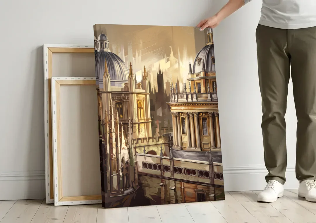 Oxford College Architecture canvas wall art leaning against a wall next to blank canvases