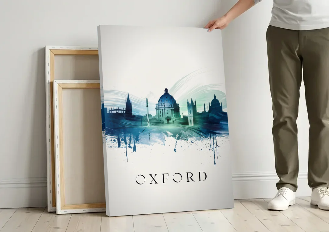 Oxford Skyline Panorama canvas wall art leaning against a wall next to blank canvases