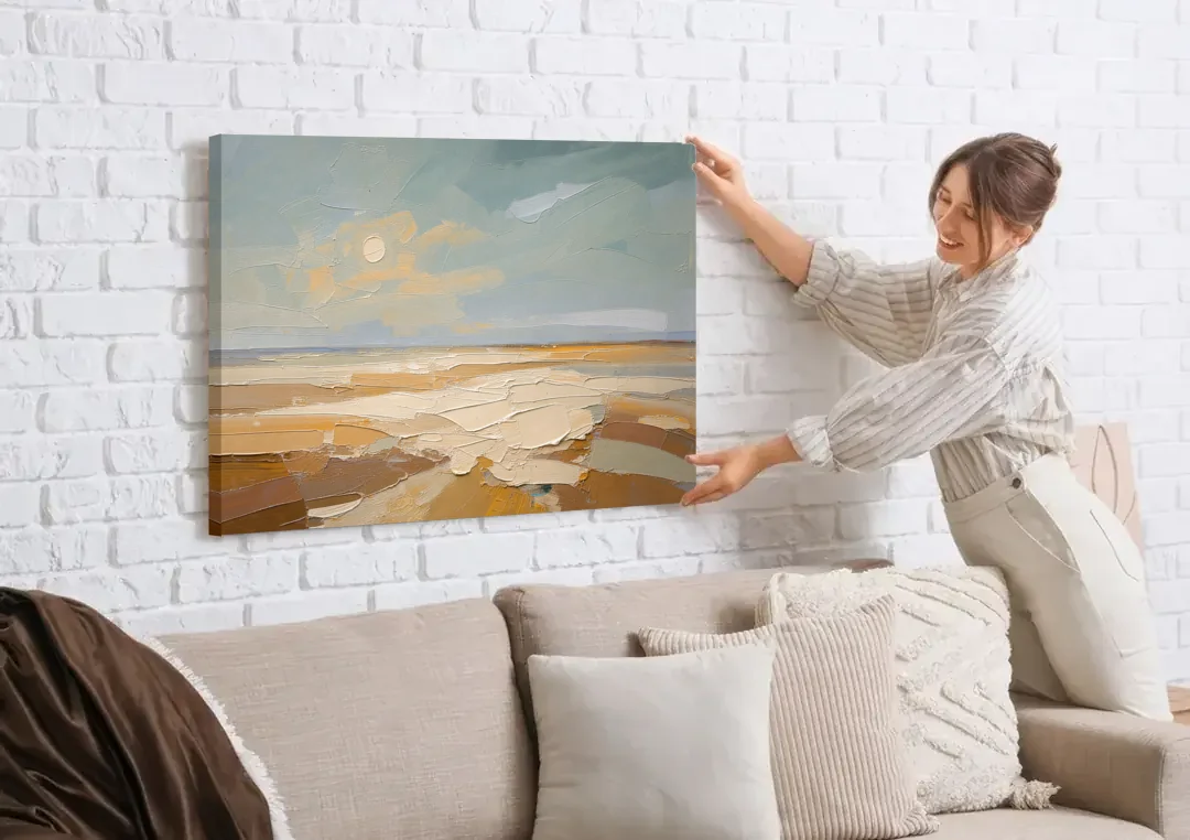 Pale Sun Over Sand Plain in Plaster Texture canvas wall art being hung on a white brick wall above a sofa