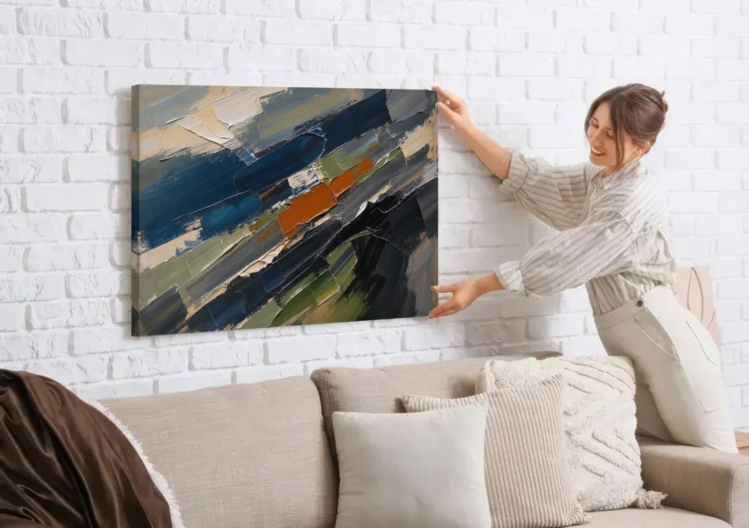 Palette Knife Abstract Art Storm Break for a Men's Office canvas wall art being hung on a white brick wall above a sofa