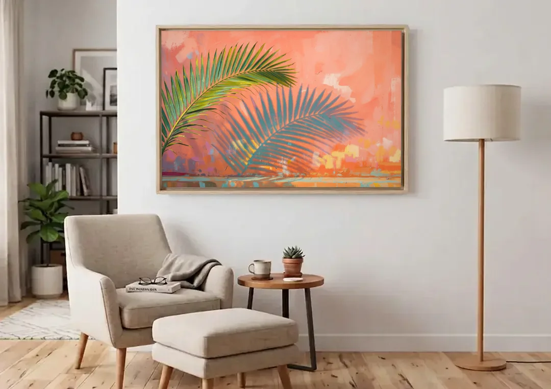 Palm Frond Wall Art with Coral Stucco Shadow canvas wall art above an armchair in a bright living room