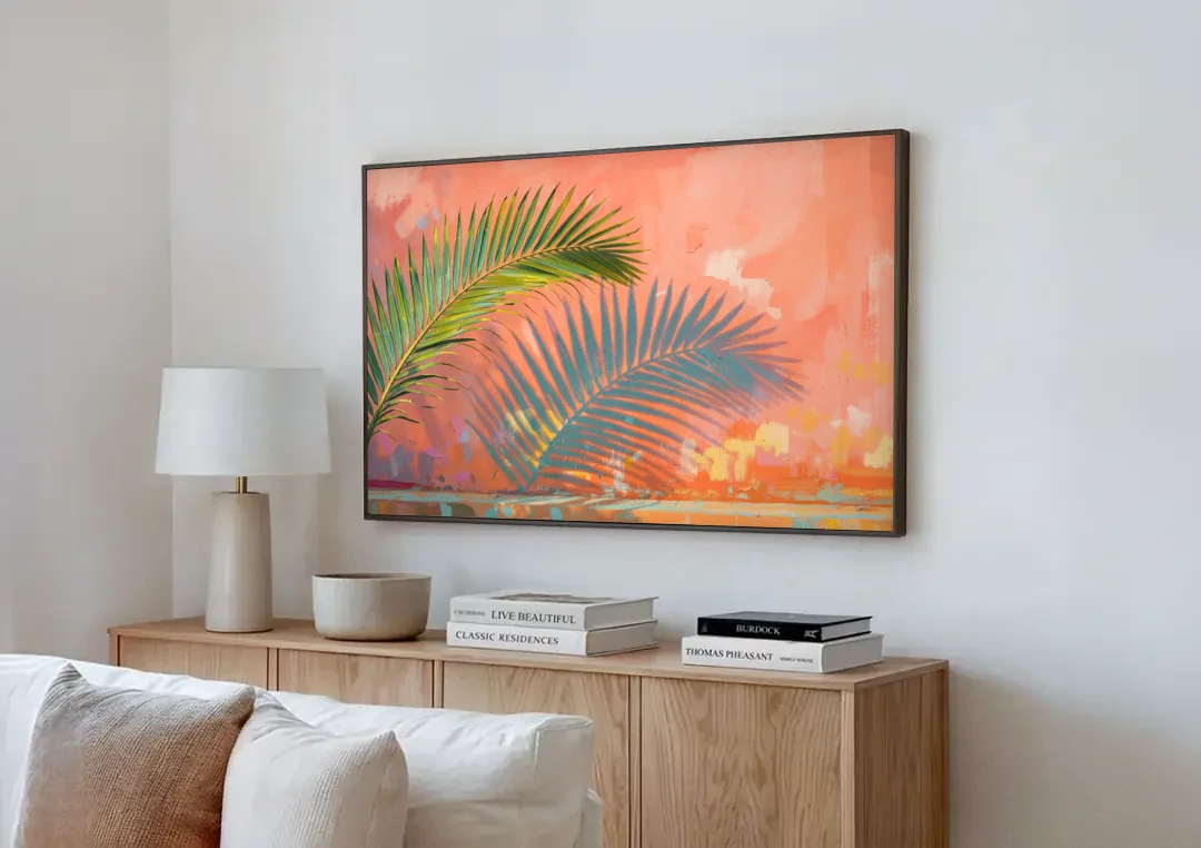Palm Frond Wall Art with Coral Stucco Shadow canvas wall art above a wooden sideboard next to a sofa