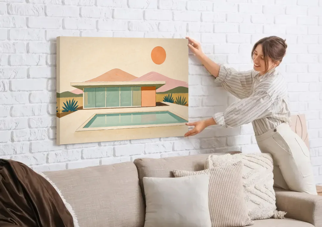 Palm Springs Art Glass Villa Beside the Pool canvas wall art being hung on a white brick wall above a sofa