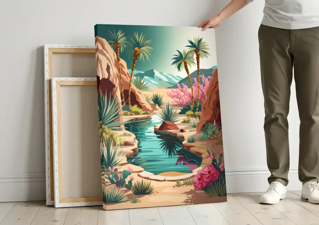 Palm Springs Desert Oasis canvas wall art leaning against a wall next to blank canvases